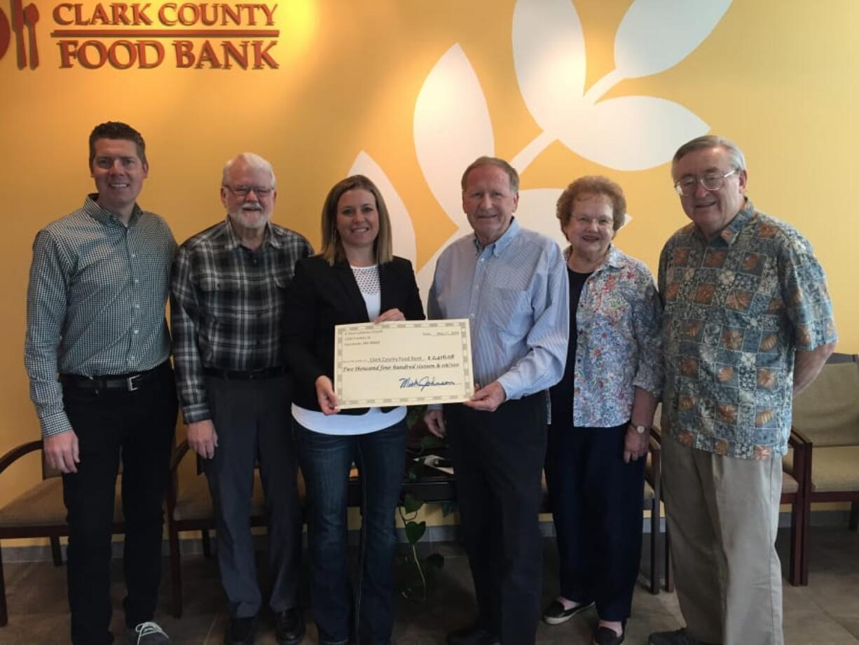 Esther Short: St. Paul Lutheran Church continued its Million Meals program with a donation to Clark County Food Bank. From left: Matt Edmonds, food bank communications manager, Joe Aalbue, St. Paul pastor, Melinda Berg, development officer for the food bank, Mick Johnson, St. Paul president, Geri Hiller and George Kaufer, both with St. Paul.