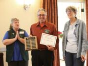 Edgewood Park: Washington State Genealogical Society President Virginia Majewski, left, presents the 2018 Outstanding Project Award to Clark County Genealogical Society President Brian Runyan, center, and Lois Bosland, right, for the “Vancouver Tax Ledger Project.”