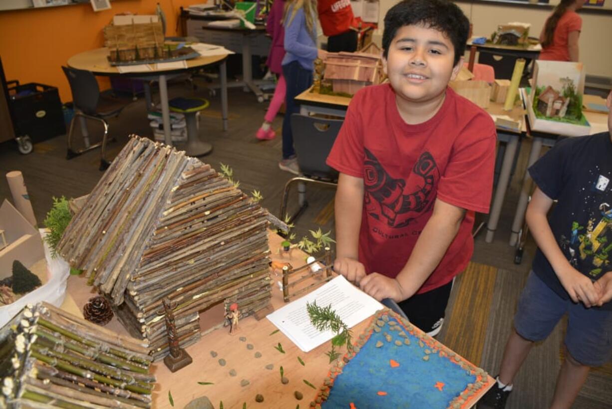 Washougal: Columbia River Gorge Elementary School third-grader Derek Rodriguez-Hernandez collected sticks from his yard at home and used those to build a plank house as part of a grade-wide project where students built plank houses based on local history and engineering concepts.