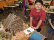 Washougal: Columbia River Gorge Elementary School third-grader Derek Rodriguez-Hernandez collected sticks from his yard at home and used those to build a plank house as part of a grade-wide project where students built plank houses based on local history and engineering concepts.