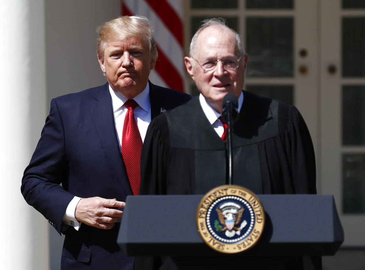 FILE - In this April 10, 2017, file photo, President Donald Trump, left, and Supreme Court Justice Anthony Kennedy participate in a public swearing-in ceremony for Justice Neil Gorsuch in the Rose Garden of the White House White House in Washington. The 81-year-old Kennedy said Tuesday, June 27, 2018, that he is retiring after more than 30 years on the court.