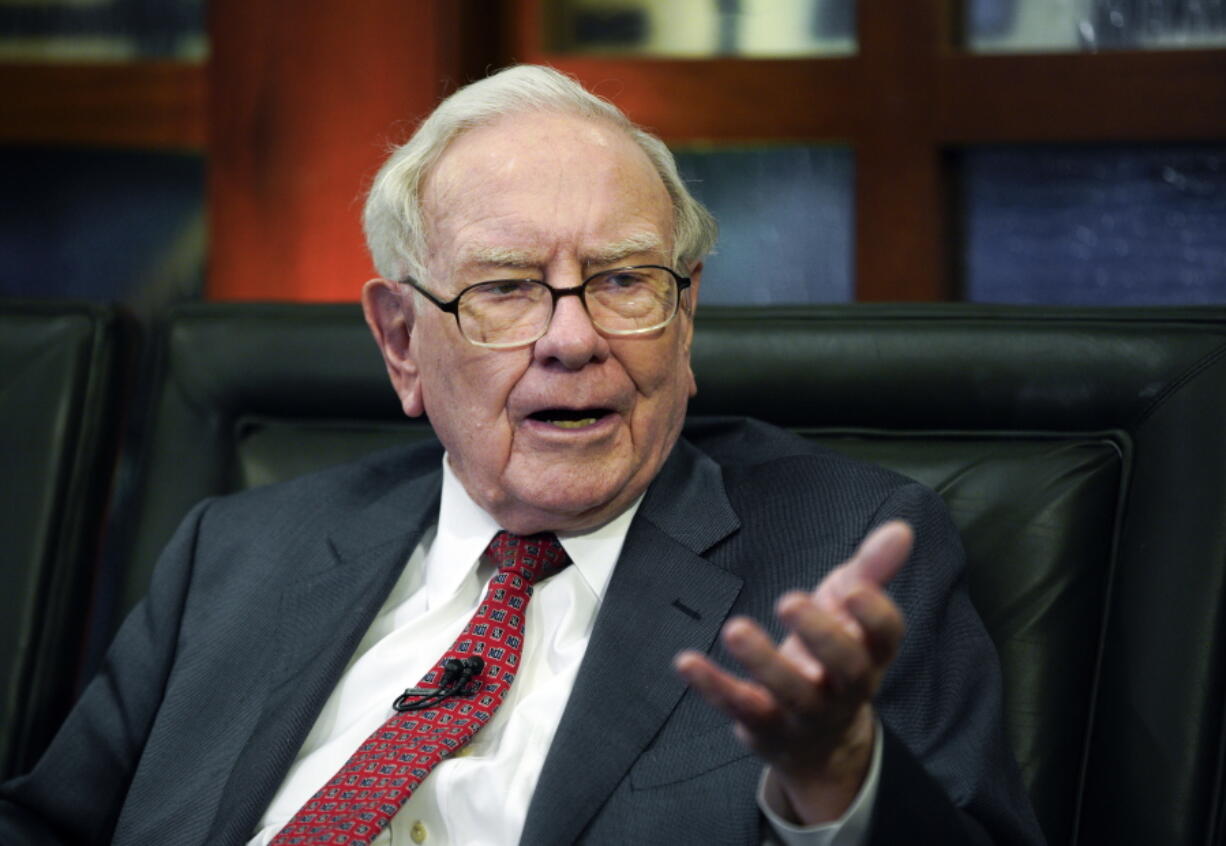 Berkshire Hathaway Chairman and CEO Warren Buffett speaks during an interview in Omaha, Neb., on May 7. The price of a private lunch with Buffett could set another record this year because the bidding is already over $3 million.