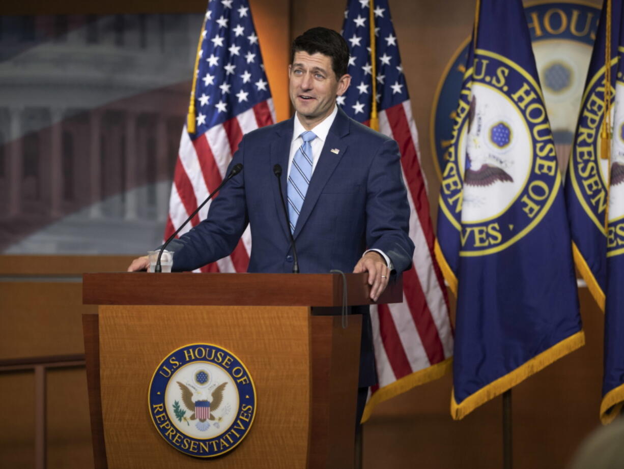 FILE - In this June 7, 2018, photo, Speaker of the House Paul Ryan, R-Wis., takes questions from reporters following a closed-door GOP meeting on immigration without reaching an agreement between conservatives and moderates, on Capitol Hill in Washington. Divided House Republicans left a bargaining session Tuesday, June 12, saying they’d not reached an immigration compromise. It remained unclear whether restive moderates would follow through on their threat to force votes soon on the troublesome issue, and questions even arose about whether they still had enough support to do that. (AP Photo/J.