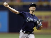 Seattle Mariners starting pitcher Mike Leake delivers to a Tampa Bay Rays batter during the first inning of a baseball game Thursday, June 7, 2018, in St. Petersburg, Fla.