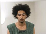 Miccah J. McDowell, 21, makes a first appearance Monday morning in Clark County Superior Court. McDowell stands accused of being involved in the attempted murder of his step-grandfather at a residence south of Ridgefield.