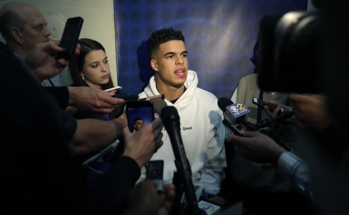 Michael Porter Jr., from Missouri, speaks to reporters during the NBA draft basketball combine in Chicago.