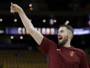 Cleveland Cavaliers forward Kevin Love warms up before Game 1 of basketball’s NBA Finals between the Golden State Warriors and the Cavaliers in Oakland, Calif., Thursday, May 31, 2018.