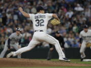 Seattle Mariners starting pitcher Marco Gonzales throws to a Tampa Bay Rays batter during the sixth inning of a baseball game Saturday, June 2, 2018, in Seattle. (AP Photo/Ted S.