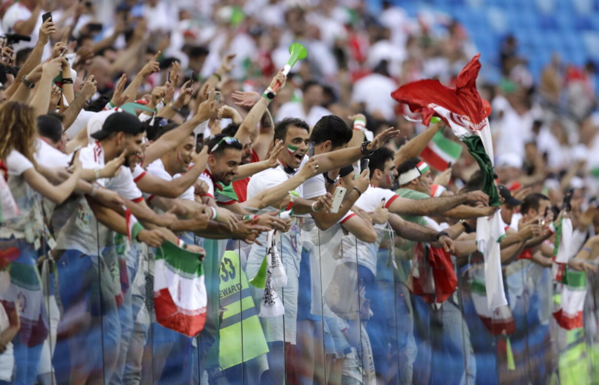 Fans for Iran celebrate the team's victory after the group B match between Morocco and Iran at the 2018 soccer World Cup in the St. Petersburg Stadium in St. Petersburg, Russia, Friday, June 15, 2018.