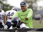 Seattle Seahawks defensive coordinator Ken Norton Jr. directs players during an NFL football practice Thursday, June 7, 2018, in Renton, Wash.