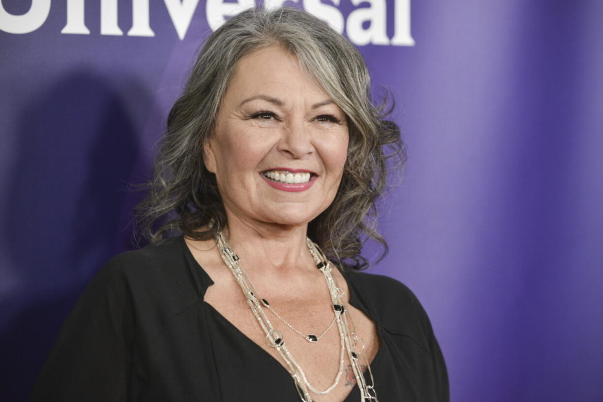 FIlE - In this April 8, 2014 file photo, Roseanne Barr arrives at the NBC Universal Summer Press Day in Pasadena, Calif. The unprecedented sudden cancellation of ABC’s TV’s top comedy “Roseanne” has left a wave of unemployment and uncertainty in its wake. Barr’s racist tweet and the almost immediate axing of her show put hundreds of people out of work.