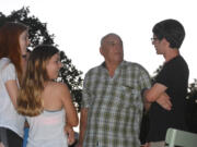 Meg Wochnick/The Columbian 

Roscoe Divine, center, shares his wisdom with sophomore Isaac Doing, right, and other members of Columbia River’s cross country team at Divine’s home in Springfield, Ore. 

The Columbian archives 

Roscoe Divine (top left) and the 1964 state title-winning Columbia River boys cross country team poses with its first-place state trophy. Divine also won the individual title that year to cap back-to-back state titles. 

Vintage Oregon Ducks 

Roscoe Divine, left, with Steve Prefontaine at the Oregon Twilight meet in 1970 at Hayward Field.