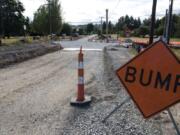 Construction has been steady at the intersection of 154th Street and 10th Avenue. But because of state law, the county is having trouble funding a related project.