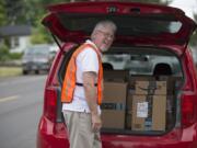 Daniel Jensen, an Amazon Flex independent contractor, delivers packages in Vancouver on Thursday morning.