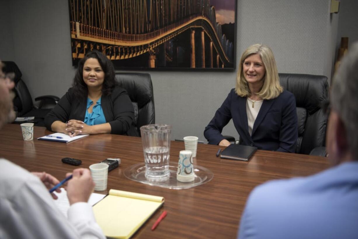 Challenger Tanisha Harris, left, and Republican state Rep. Vicki Kraft face off during a meeting of The Columbian’s Editorial Board in July.