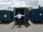 Operations Superintendent Ryan Miles with Vancouver Public Works opens a container rented from Waste Connections that is used to store items collected from homeless camps around the city. The containers are kept on city-owned property in west Vancouver.