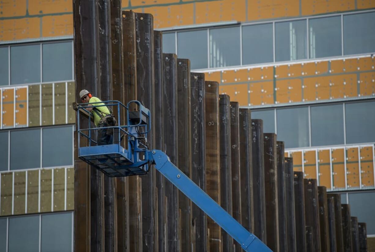 Construction continues at Hotel Indigo and Kirkland Tower at the Vancouver Waterfront on earlier this month.