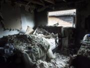 The bedroom of a resident is seen here following a fire at an apartment complex on Bridge Street in Rose Village, Monday morning, July 9, 2018.