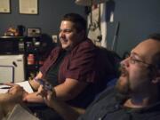 Eli Schwartz, left, and Sean Nance, right, both of Vancouver, consider “Transformers: The Last Knight” overstuffed with many continuity issues. The pair chose to watch a bad movie as a way to subvert the aim of overstuffed, nonsensical blockbuster films. “We’re being a fan these movies don’t want,” Schwartz said.