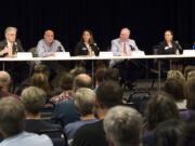 3rd Congressional District candidates, from left, David McDevitt, Michael Cortney, Carolyn Long, Earl Bowerman and Dorothy Gasque participated in the League of Women Voters’ first congressional forum Thursday evening. Candidates addressed topics including immigration, federal spending and campaign reform.