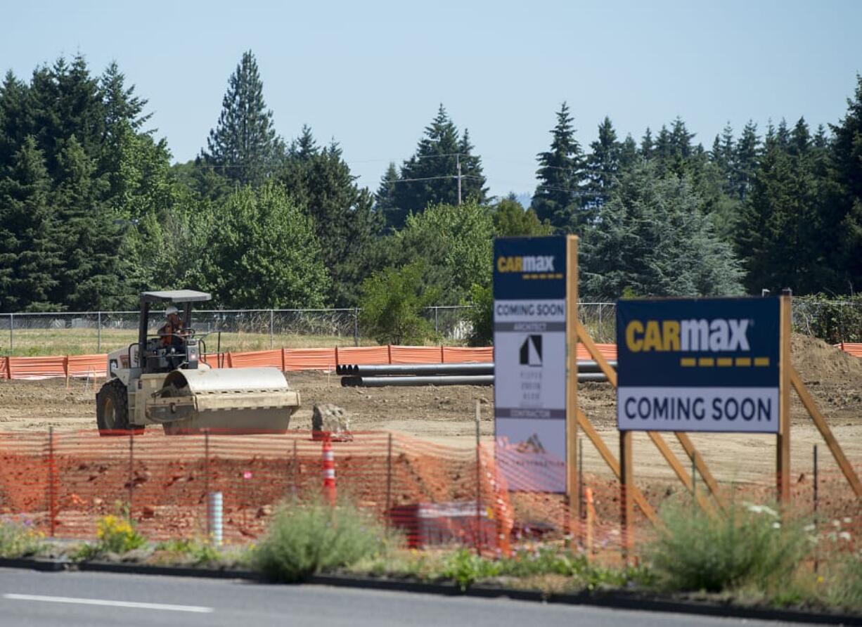 Construction continues Thursday morning on the future CarMax location near the intersection of Northeast 117th Avenue and Northeast 71st Street. The used car dealership will be the Fortune 500 company’s fifth location in Washington.