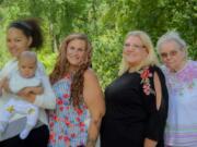 At left is Lyric Henifin, three months, held by his mother, Tourei Henifin, 24, both of Phoenix, Ariz., at Daybreak Park, Battle Ground, in July. Also pictured, from right, are his great-great-grandmother, Sylvia Henifin, 88, of Vancouver; great-grandmother, Victoria Henifin, 61, of Vancouver; and grandmother, Chanell Henifin, 39, of Phoenix.