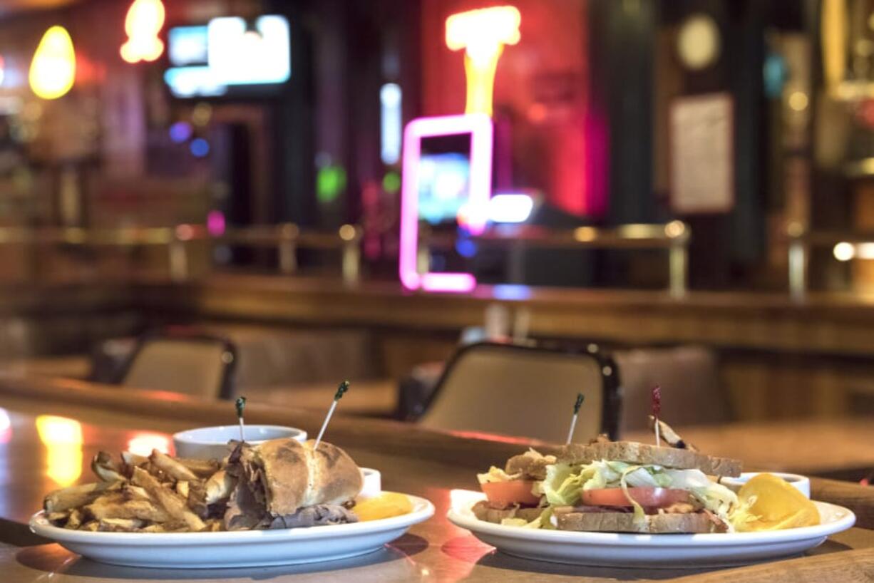 The French dip sandwich, left, and the BLT sandwich are among the offerings at Sellberg’s Tavern.