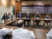 Third Congressional District candidates, from left, Dorothy Gasque, Earl Bowerman, Martin Hash, David McDevitt, Michael Cortney, and Carolyn Long meet with The Columbian’s Editorial Board in Vancouver on Wednesday.