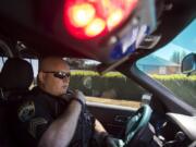 Woodland Police Sgt. Jim Keller makes a traffic stop on Friday. Rumors have spread recently that city officials are looking at disbanding the department to contract out with Cowlitz County Sheriff’s Department, but Woodland officials say they’re just looking at all their options for police service and that there’s no plan on getting rid of the city’s police force.