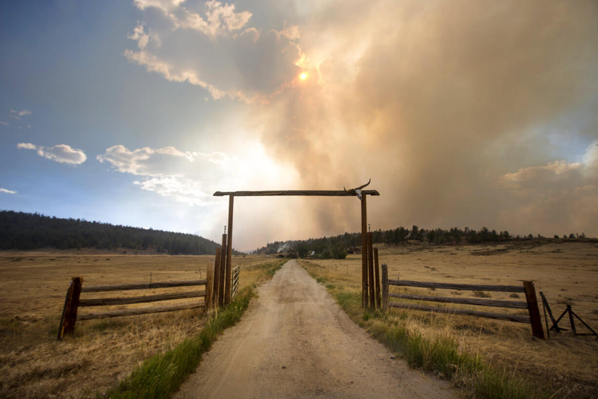 The Weston Pass Fire threatens homes along Highway 285, Monday, July 2, 2018, near Fairplay, Colo. In Colorado, more than 2,500 homes were under evacuation orders as firefighters battled more than a half-dozen wildfires.