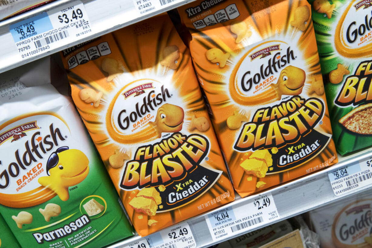 Pepperidge Farm Goldfish Flavor Blasted Xtra Cheddar crackers are on display at a supermarket in the East Village neighborhood of Manhattan, Tuesday, July 24, 2018. Flavor Blasted Xtra Cheddar is one of four varieties of Goldfish Crackers Pepperidge Farm is voluntarily recalling because of fears they could potentially have salmonella.