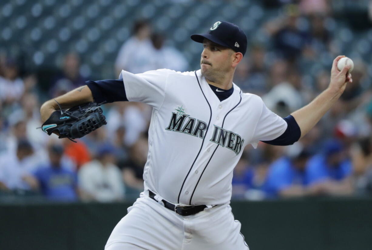 Seattle Mariners starting pitcher James Paxton throws against the Houston Astros during the first inning of a baseball game, Monday, July 30, 2018, in Seattle. (AP Photo/Ted S.