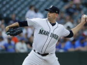 Seattle Mariners starting pitcher James Paxton throws against the Houston Astros during the first inning of a baseball game, Monday, July 30, 2018, in Seattle. (AP Photo/Ted S.