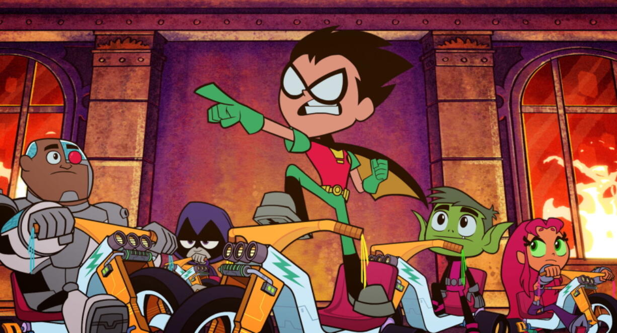 This image released by Warner Bros. Pictures shows characters, from left, Cyborg, voiced by Khary Payton, Raven, voiced by Tara Strong, Robin voiced by Scott Menville, Beast Boy, voiced by Greg Cipes, and Starfire, voiced by Hynden Walch, in a scene from “Teen Titans Go! to the Movies. (Warner Bros.
