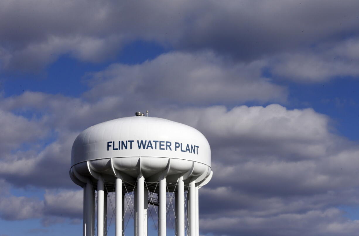 The Flint Water Plant water tower is seen in March 2016 in Flint, Mich. A federal watchdog is calling on the U.S. Environmental Protection Agency to strengthen its oversight of state drinking water systems in the wake of the lead crisis in Flint.