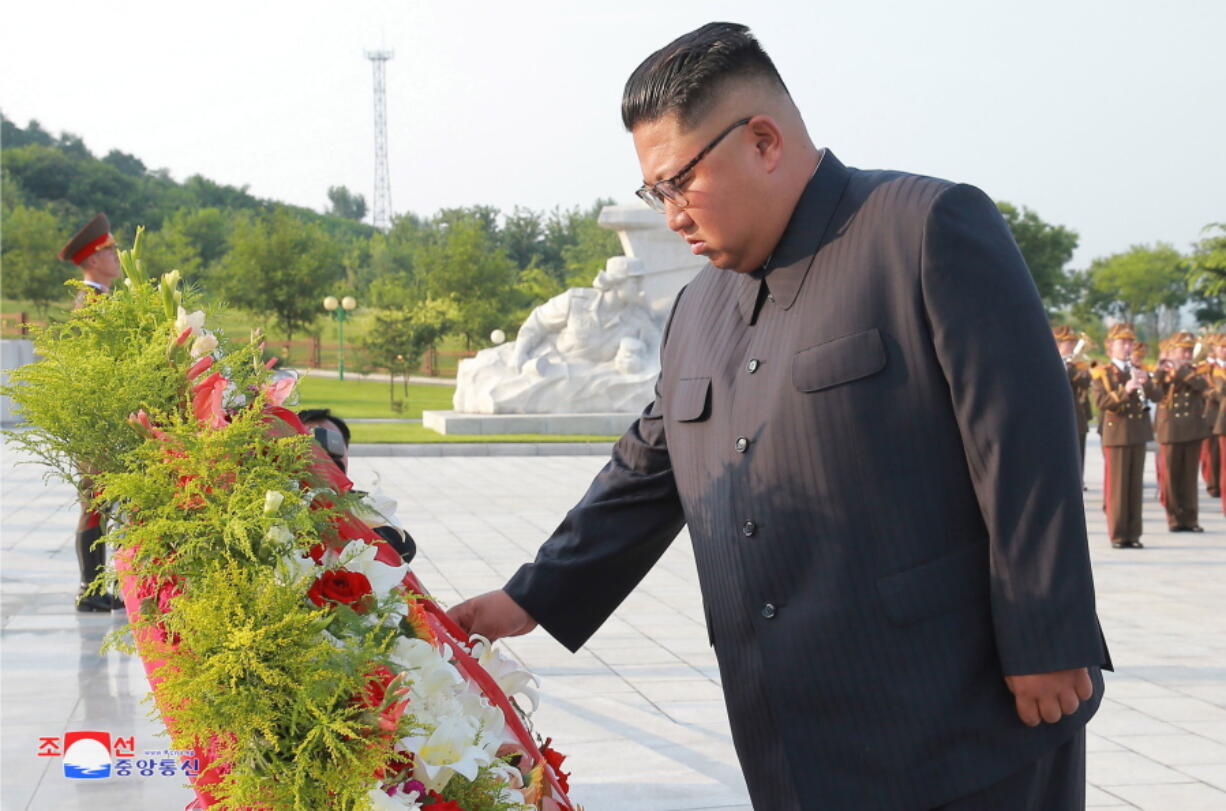 In this July 26, 2018, photo, provided on July 27, by the North Korean government, North Korean leader Kim Jong Un visits the tombs, on the 65th anniversary of the signing of the ceasefire armistice that ends the fighting in the Korean War, in Pyongyang. Independent journalists were not given access to cover the event depicted in this image distributed by the North Korean government. The content of this image is as provided and cannot be independently verified. Korean language watermark on image as provided by source reads: “KCNA” which is the abbreviation for Korean Central News Agency.