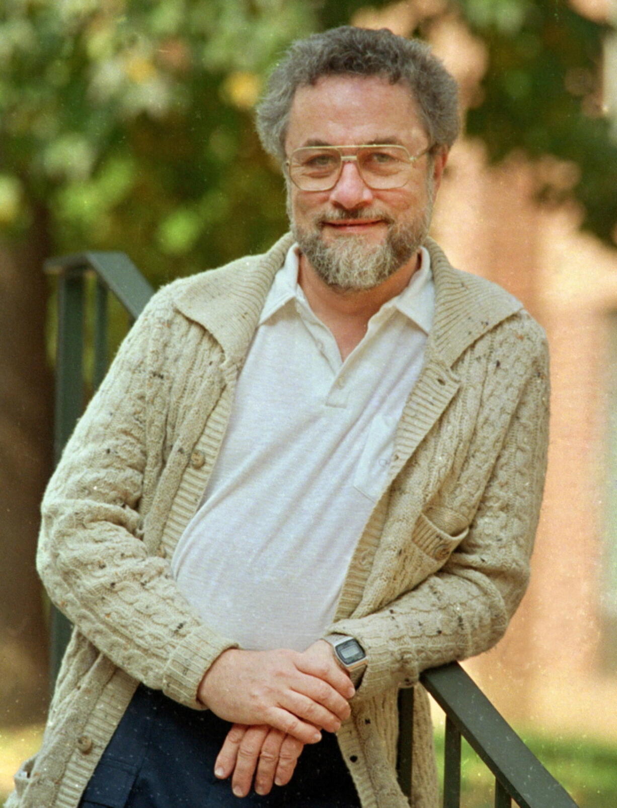 FILE - In this October 1987, file photo, Adrian Cronauer, a disc jockey on the Saigon-based Dawn Buster radio show from 1965-1966 whose experiences in the Vietnam War were chronicled in the movie “Good Morning, Vietnam,” poses outside his home in Philadelphia, Pa. Cronauer died Wednesday, July 18, 2018. He was 79.