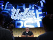 UCLA coach Chip Kelly talks to reporters at the Pac-12 Conference NCAA college football media day in Los Angeles, Wednesday, July 25, 2018. (AP Photo/Jae C.