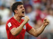 England’s Harry Maguire celebrates victory of his team over Sweden during the quarterfinal match between Sweden and England at the 2018 soccer World Cup in the Samara Arena, in Samara, Russia, Saturday, July 7, 2018.