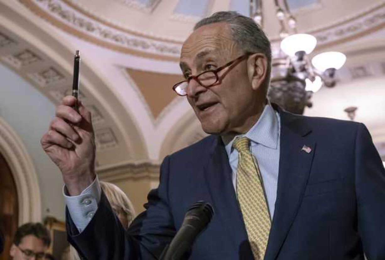 In this June 19, 2018 file photo, Senate Minority Leader Chuck Schumer, D-N.Y., talks during a news conference on Capitol Hill in Washington. Schumer tried Monday to rally public opposition to any Supreme Court pick by President Donald Trump who'd oppose abortion rights, issuing a striking campaign season call to action for voters to prevent such a nominee by putting "pressure on the Senate." (AP Photo/J.