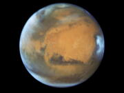 The planet Mars. A study published Wednesday in the journal Science suggests a huge lake of salty water appears to be buried deep in Mars, raising the possibility of finding life on the red planet. (NASA/ESA/Hubble Heritage Team - STScI/AURA, J. Bell - ASU, M.