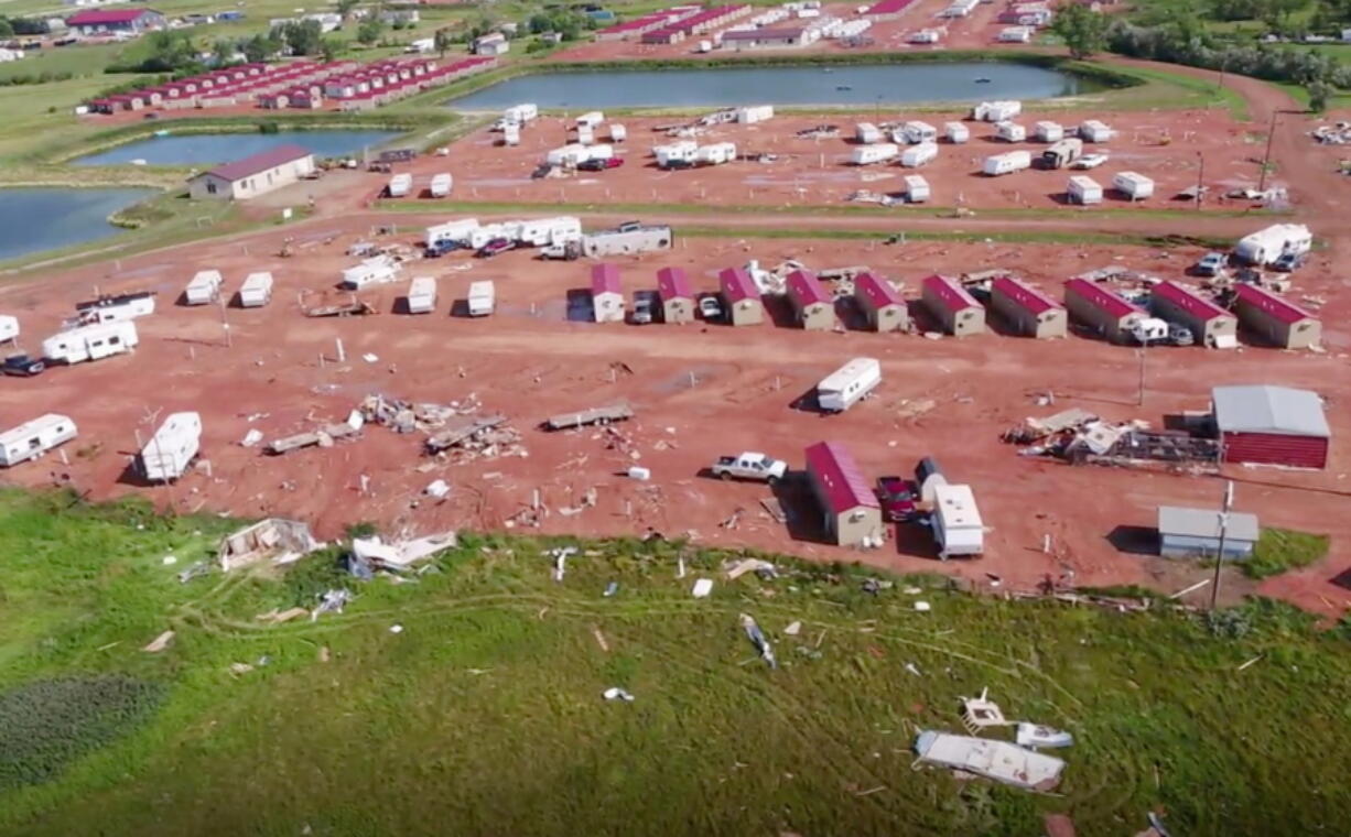 Damage at an RV park Tuesday in Watford City, N.D., after a violent storm whipped through the northwestern North Dakota city overnight. More than two dozen people were hurt in the storm that overturned recreational vehicles and tossed mobile homes, officials said Tuesday.