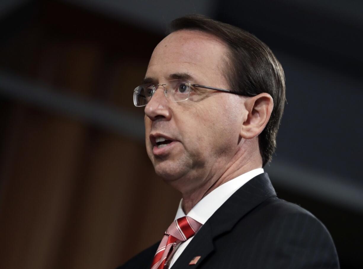 Deputy Attorney General Rod Rosenstein speaks during a news conference at the Department of Justic on Friday in Washington.