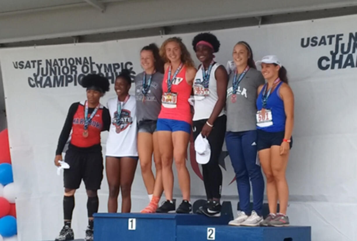 Prairie High track and field athlete Valerie Schmidt, center in red, won the won the heptathlon for ages 17-18 at the USA Track & Field National Junior Olympic Championships, held July 23-24 at Greensboro, N.C.