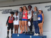 Prairie High track and field athlete Valerie Schmidt, center in red, won the won the heptathlon for ages 17-18 at the USA Track & Field National Junior Olympic Championships, held July 23-24 at Greensboro, N.C.