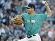 Seattle Mariners starting pitcher Wade LeBlanc throws to a Chicago White Sox batter during the first inning of a baseball game Friday, July 20, 2018, in Seattle. (AP Photo/Ted S.