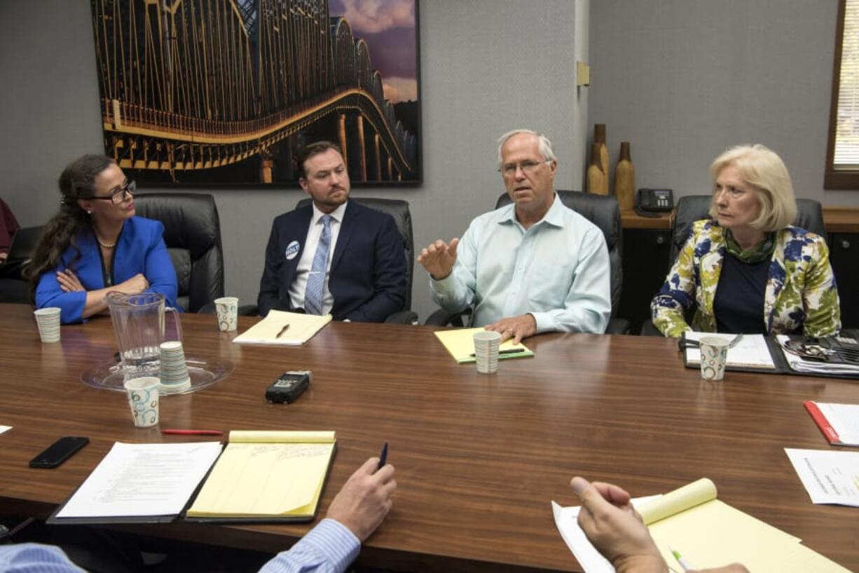 Christy Stanley, from left, who has since dropped out of the race, Eric Holt, Marc Boldt and Eileen Quiring meet with The Columbian’s Editorial Board early this month.