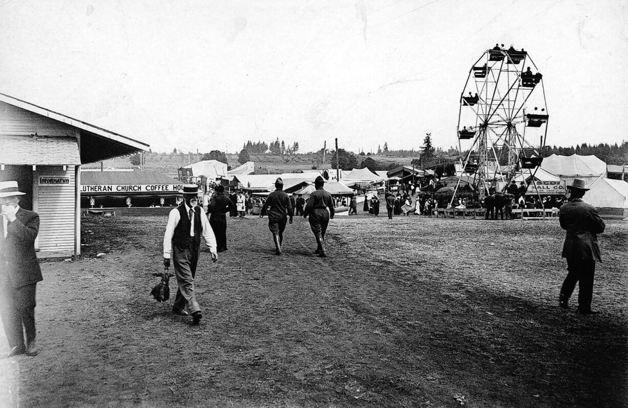 Fair manager Chat Knight walks in Bagley Park during the 1912 Clark County Fair there.