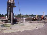 Workers begin the cleanup of the Frontier Hard Chrome site at 113 Y St. in Vancouver in June of 2003. After years of cleanup work, the Environmental Protection Agency deleted the site from its Superfund list effective Monday.