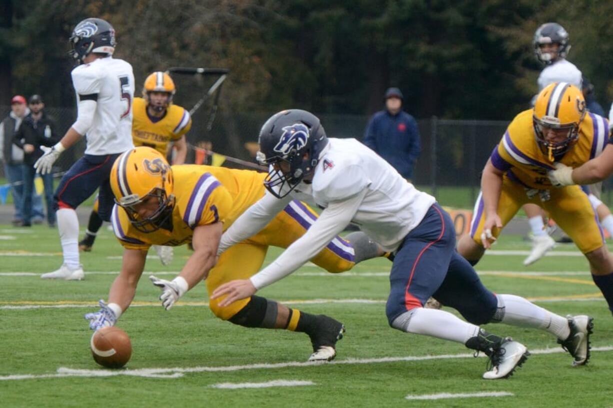 Logan Wilson, left, is among a group of Columbia River linebackers that coach Christian Swain calls among the best he has coached.